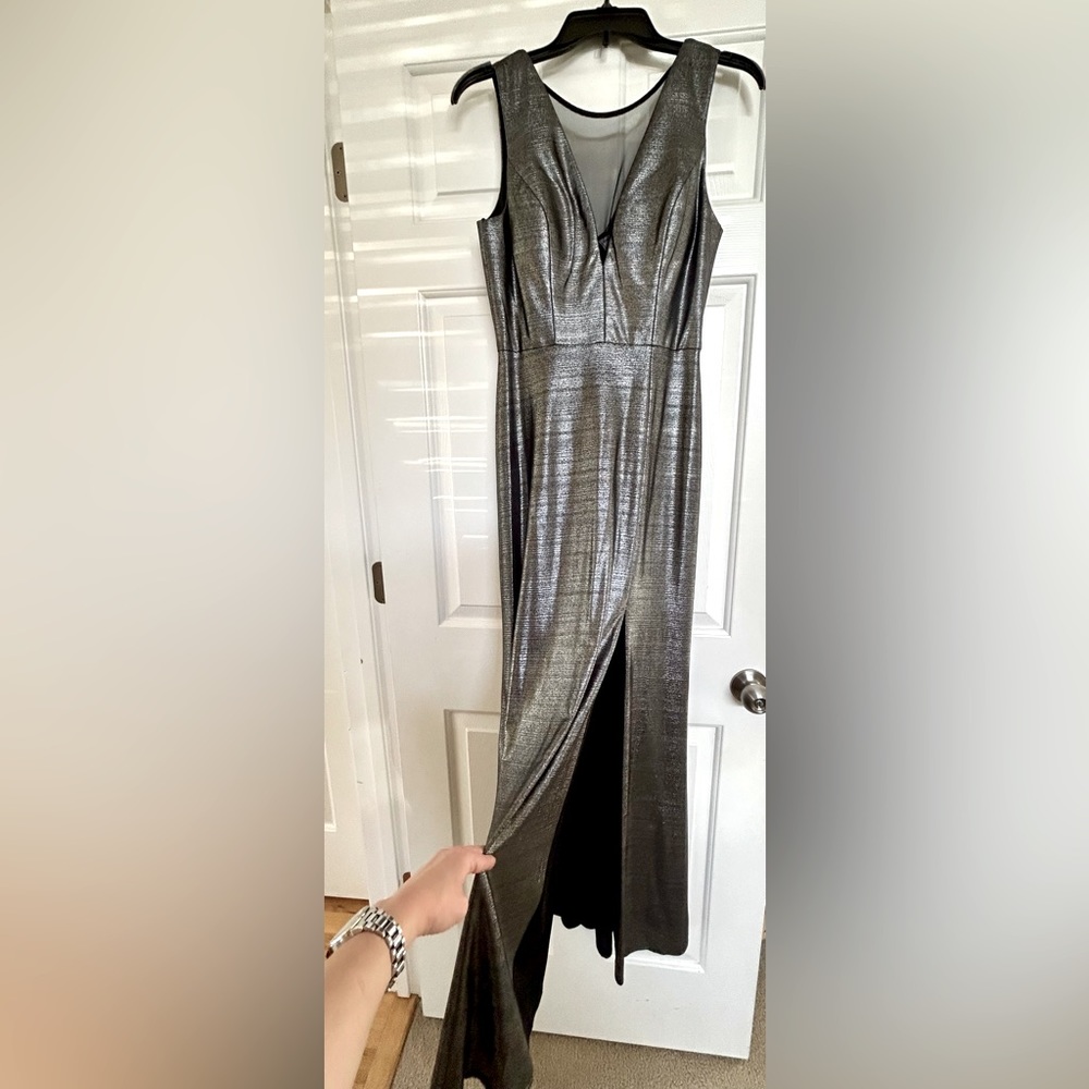 BRAND NEW, never worn! STUNNING, silver/black, shimmering fabric. Size 6 gown.